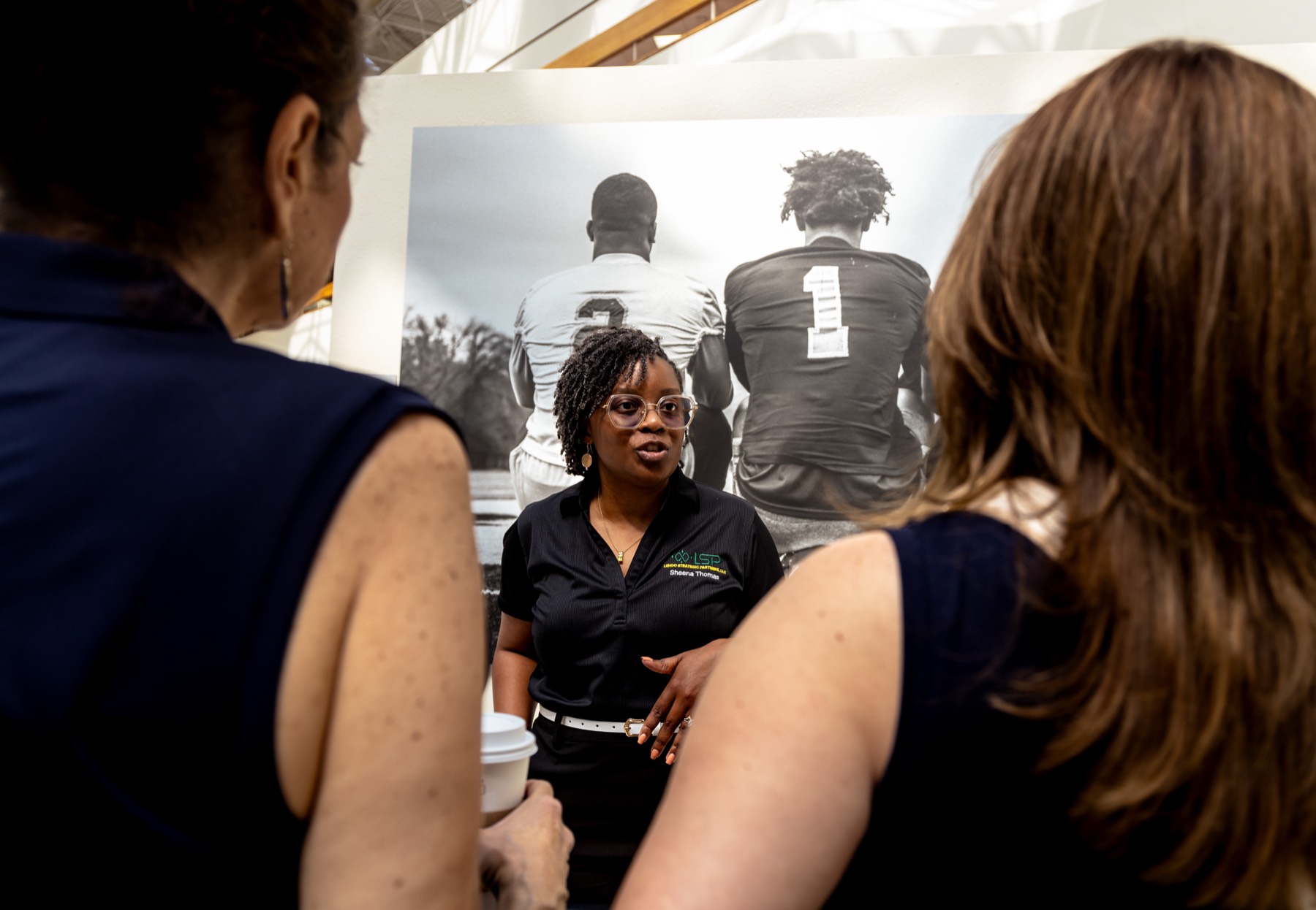 Sheena Thomas engaging with corporate attendees at a supplier diversity event